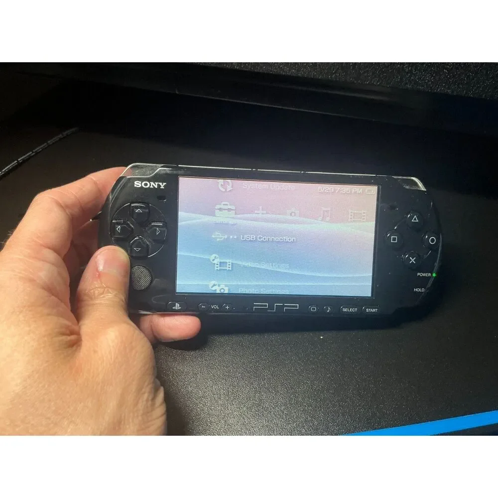 Sony PSP-3001 Bundle w/ New Battery, Sony 1GB Memory Stick, Charger & Game